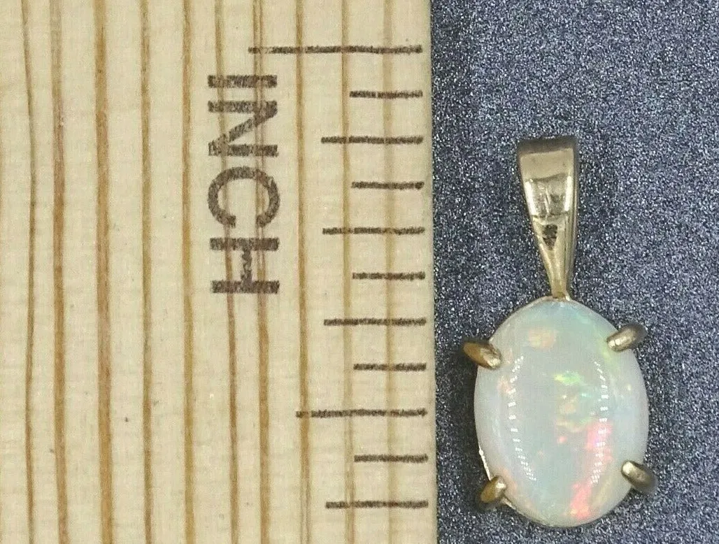 "Valentine's Sparkle: Pre-Loved 10ct Yellow Gold Opal Claw Set Pendant"