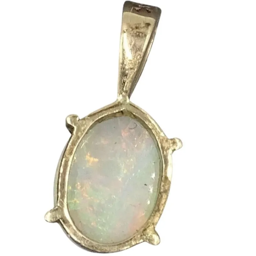 "Valentine's Sparkle: Pre-Loved 10ct Yellow Gold Opal Claw Set Pendant"